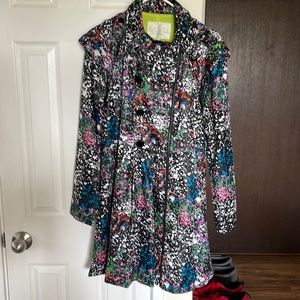 Neon splatter trench coat. Sleeves zip off to make dress. Fits like small